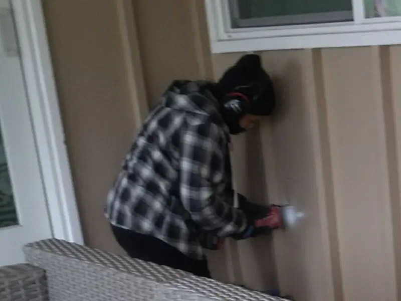 Professional electrician installing an exterior outlet in Mount Pleasant